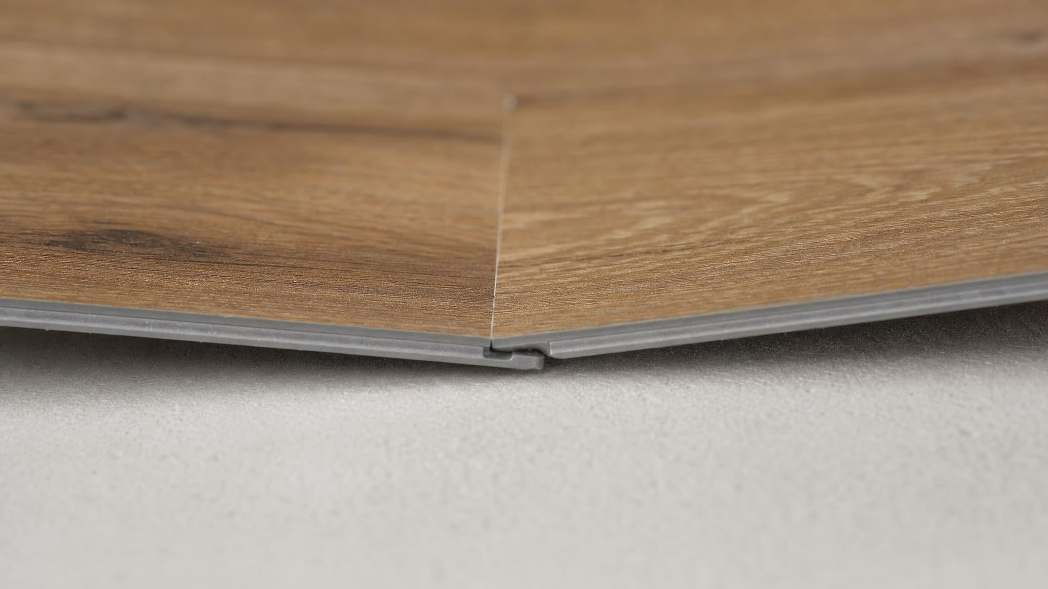 Close-up comparison of types of LVP locking systems on luxury vinyl planks